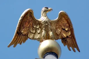 Eagle statue at the top of the Antwerp City Hall