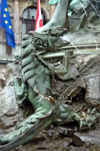 The dragon-monster at the foot of the Brabo Fountain in Antwerp