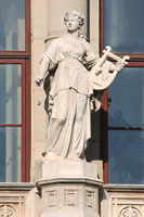 Statue of a muse on the facade of the Vigadó in Budapest