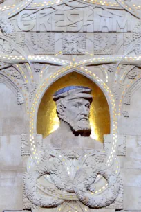 Bust of Sir Thomas Greshamon the facade of the Gresham Palace in Budapest