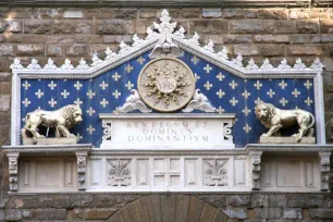 The frieze above the entrance of the Palazzo Vecchio in Florence