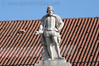 Statue of Gil Vicente on the top of the National Theater at the Rossio in Lisbon