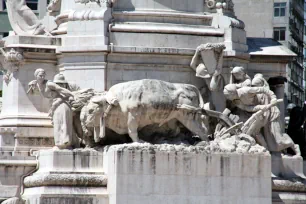 Sculture of parmers ploughing on the monument of the marquis of Pombal
