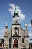 Steeple and front facade of the Chapelle Notre-Dame-de-Bon-Secours