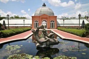 Lily pond and Conservatory of the Two Sisters in the Botanical Garden in New Orleans