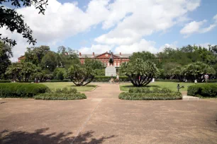 The garden of Jackson Square seen towards one of the Pontalba Buildings