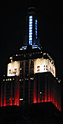 The spire of the Empire State Building at night