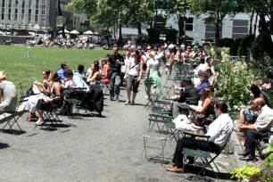 People relaxing in Bryant Park, New York City