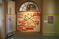 spray-painting messages, Hurricane Museum, New Orleans