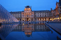 The Louvre reflected in a pool