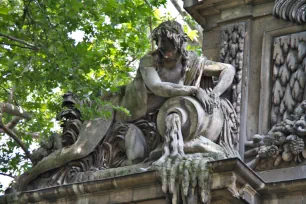 Statue of a river god on the Medici Fountain in Paris