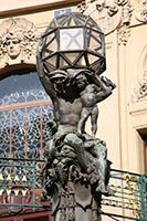 Decorated Torch­bearer  at the entrance of the Municipal House in Prague