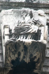 Relief of a sitting god on the Arch of Janus in Rome