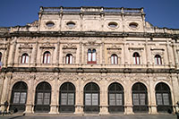 The west facade of the city hall or ayuntamiento in Seville, Spain