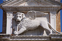 Lion Sculpture on top of the Porta Magna at the Arsenale in Venice