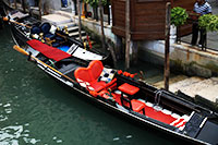 gondola with plush seats, Venice