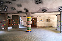 Colorful Pillars support the Hundertwasserhaus in Vienna