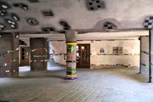 Colorful Pillars support the Hundertwasserhaus in Vienna
